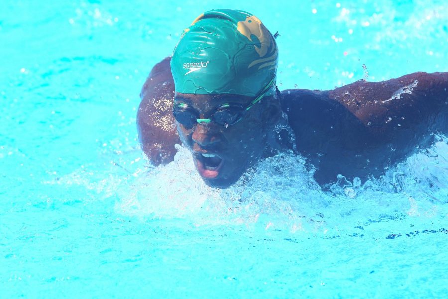 Junior Yohance Forde competes as a member of the ILS swim team.