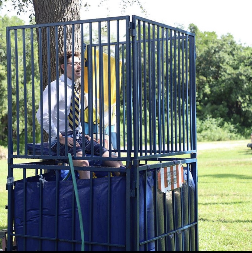 Mr. Jude dressed as a Belen student, preparing to get dunked. 