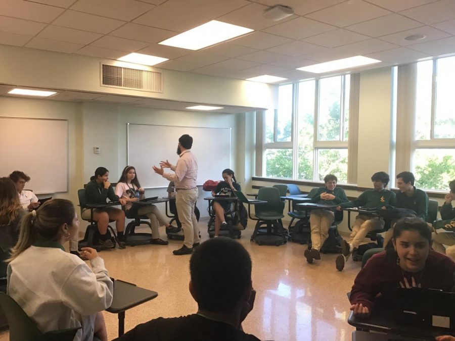 Mr. Gamwell helping students during a Socratic. 
Photo credit: Noor Andre 