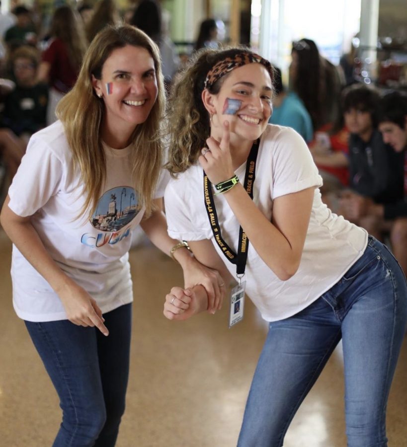 Senior Katia Perez-Sanchez and Ms. De La Rosa dancing the afternoon away at Feria Latina. 