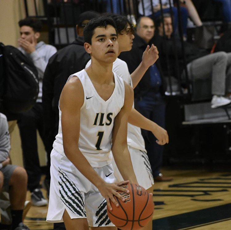 Senior Jonny Oliva helped the ILS boys varsity basketball team defeat Key West this week.