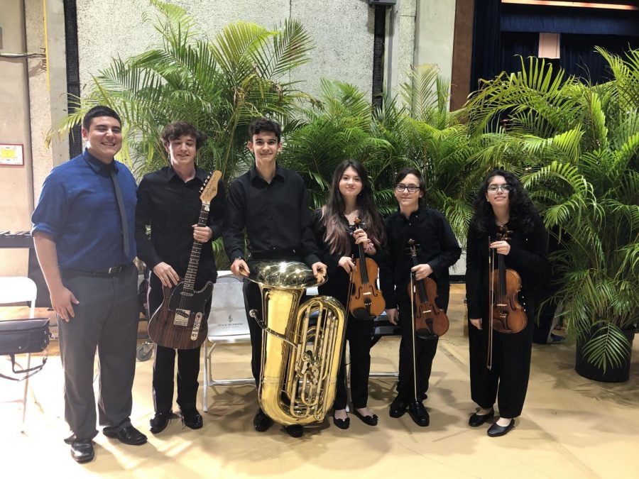 Mr. Alicandu with the ILS musicians at the Miami-Dade Honors concert.