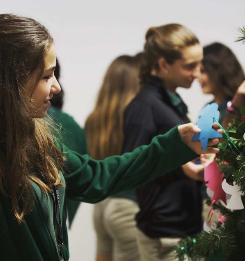 ILS students chose names for the Angel Tree project during the presentation in the SLC.