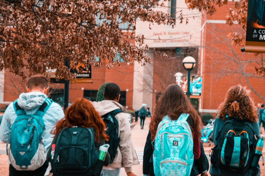 Students walking to their college class. 