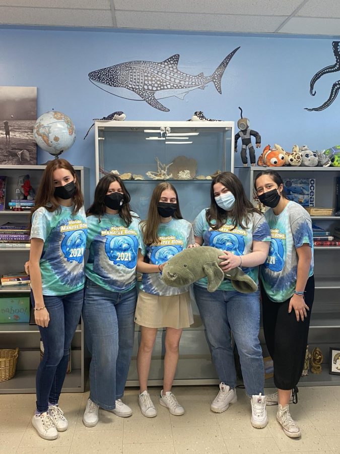 Seniors Alma Pichardo, Belen Gonzalez, Meghan Swan, Sofia Farres, and Veronica Oliveira (left to right) in their Ocean Bowl shirts at school on Monday after participating in the Ocean Bowl over the weekend. 
