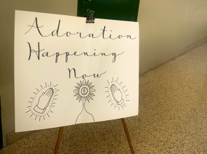 A poster set up right outside the chapel, to make staff and students aware of the tradition unfolding behind the door.