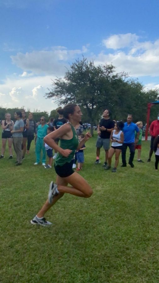 Senior Mariam Osman competes at the Cross Country meet.