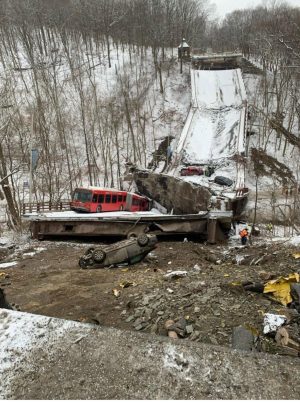 Cars and buses are tragically destroyed.