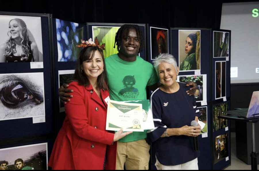 Jude Servius collects his prize for second place in the film category.