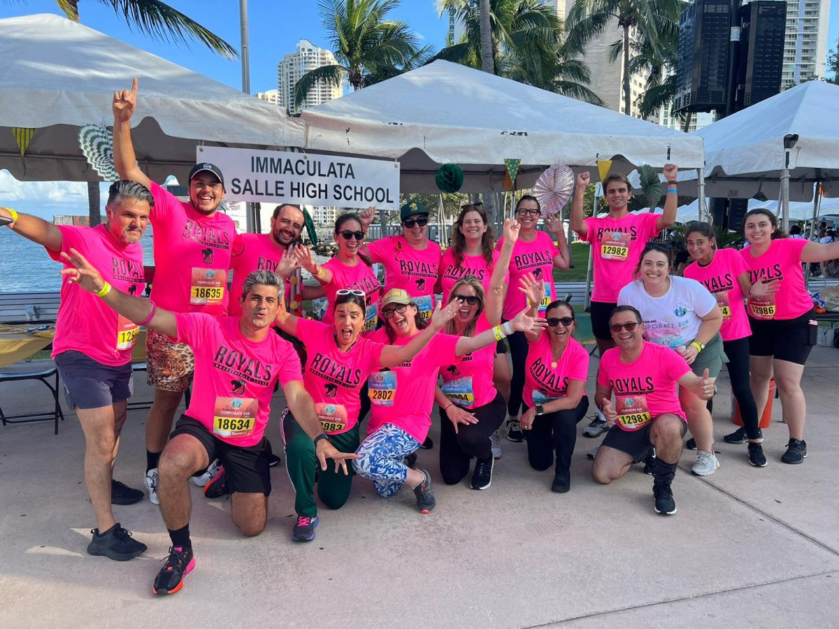 The ILS Faculty/Staff Lexus Corporate Run Team for 2024 competed again this April. Ms. Ramirez, the Team Captain, is kneeling in the center wearing green Adidas track pants.