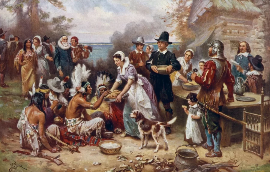 Pilgrims and Native American in the 1600’s celebrate the three-day Thanksgiving feast.
