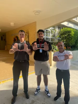 Senior Frankie Tinilau receives some special visitors at the ILS campus.
