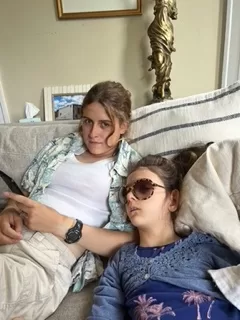 Caroline and her sister Vivienne watch TV together. Even though she can see, Vivienne received services at the Miami Lighthouse for the Blind where she met Mason, a boy with a similar disorder. Vivienne appreciated spending time with him as they were able to communicate with one another non-verbally using hand gestures. 