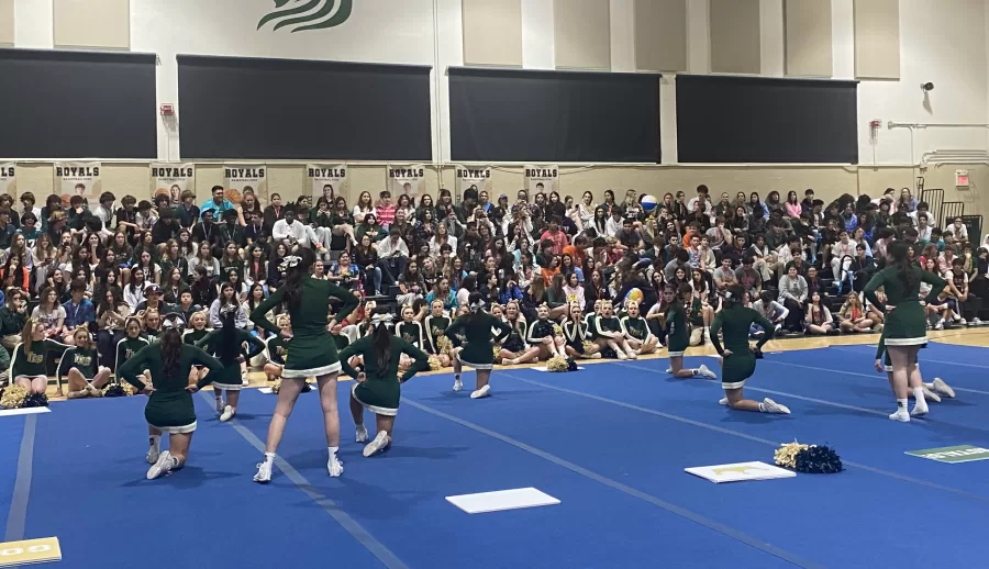 Varsity cheerleaders perform at the prep rally after announcing the spring sports. 