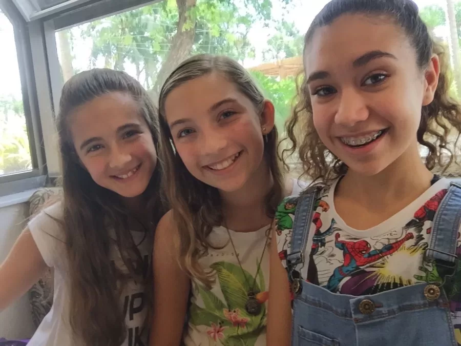 Photo of the trio, Maia, Bella, and Daniela in 4th grade. 