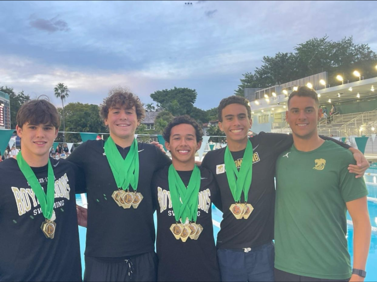 The ILS boys swim celebrate a win at their recent competition.