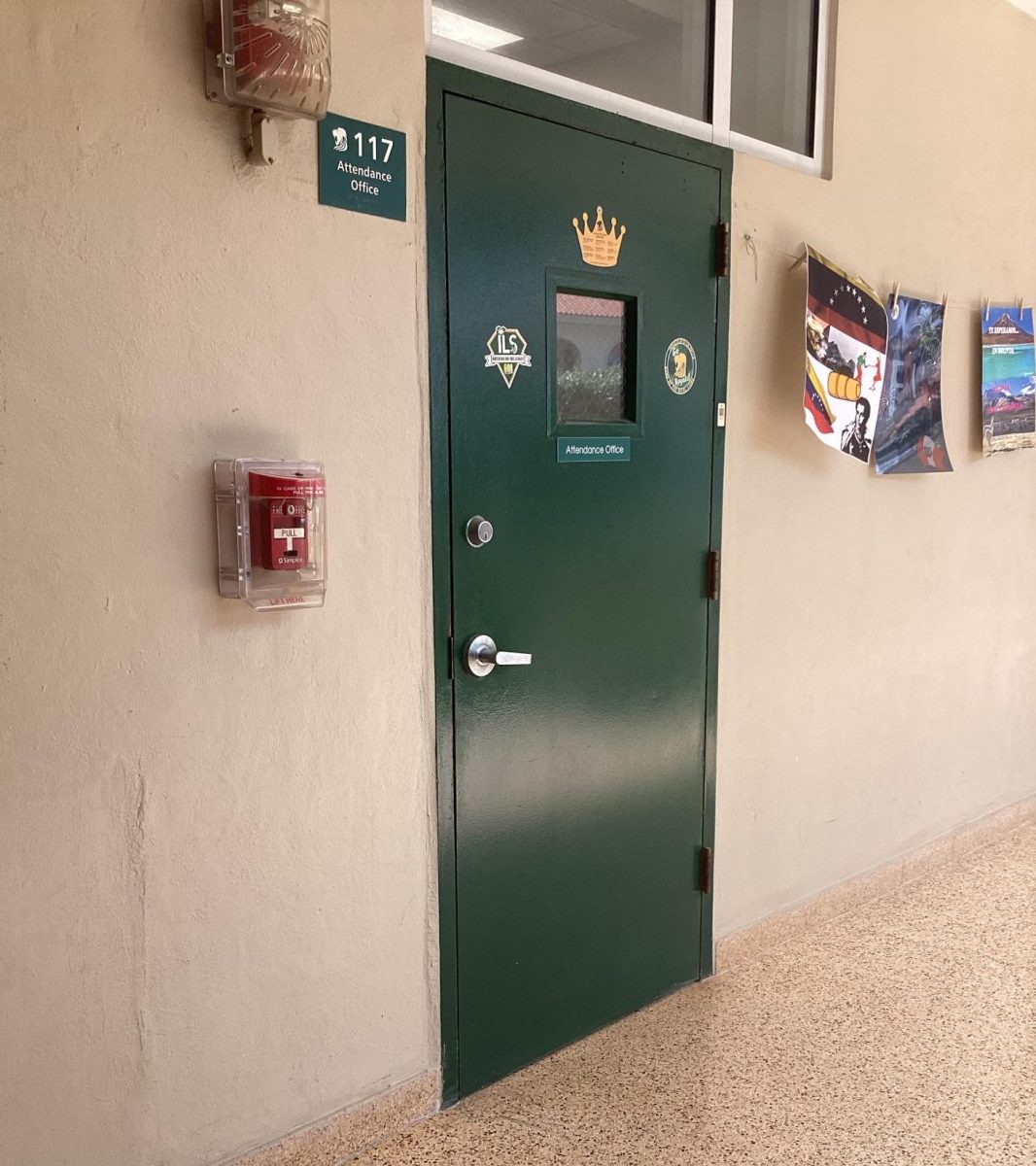 10 October - (7:47am) Behind the closed Attendance Office door, over 10 students wait in line for Mrs. Ana Garciga to write them a late pass.