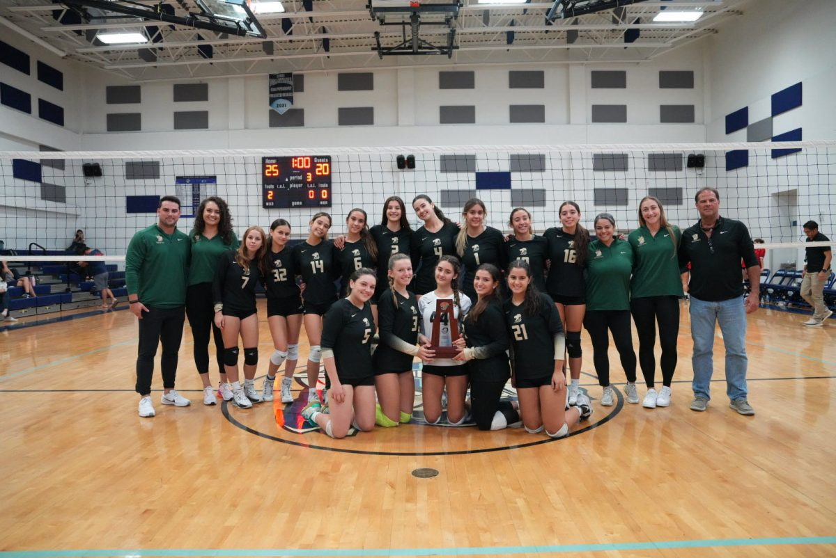The+2023+Immaculata-La+Salle+Girls+Volleyball+District+Champions+beams+with+pride.+