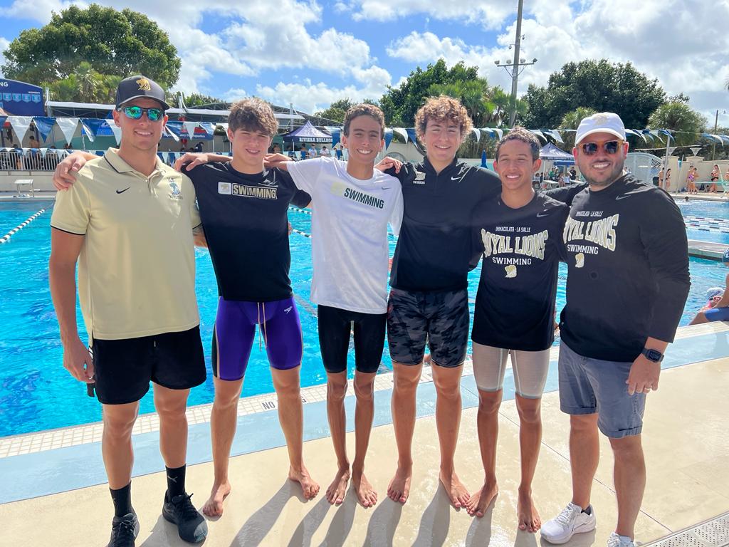 The Boys swim team along with their coaches performed well at regionals. 