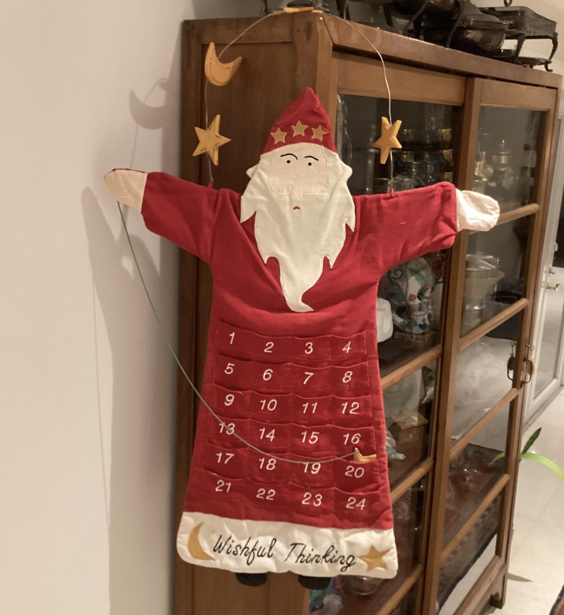 This Advent calendar Santa wears the iconic red robe and hat.