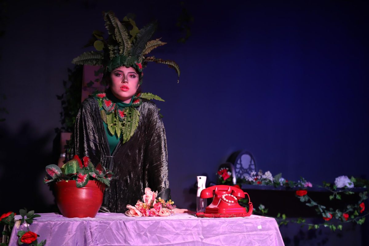 An award-winning photograph of sophomore Celina Sosa portraying Audrey II in the ILS production of Little Shop of Horrors: A Musical Review.