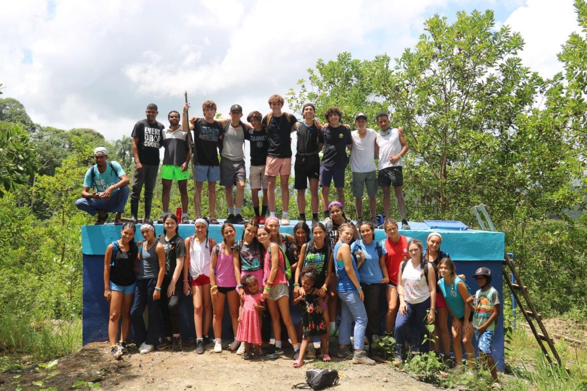 This+photograph+featuring+a+large+group+of+Blue+Mission+volunteers+was+for+a+trip+they+took+to+the+Dominican+Republic.