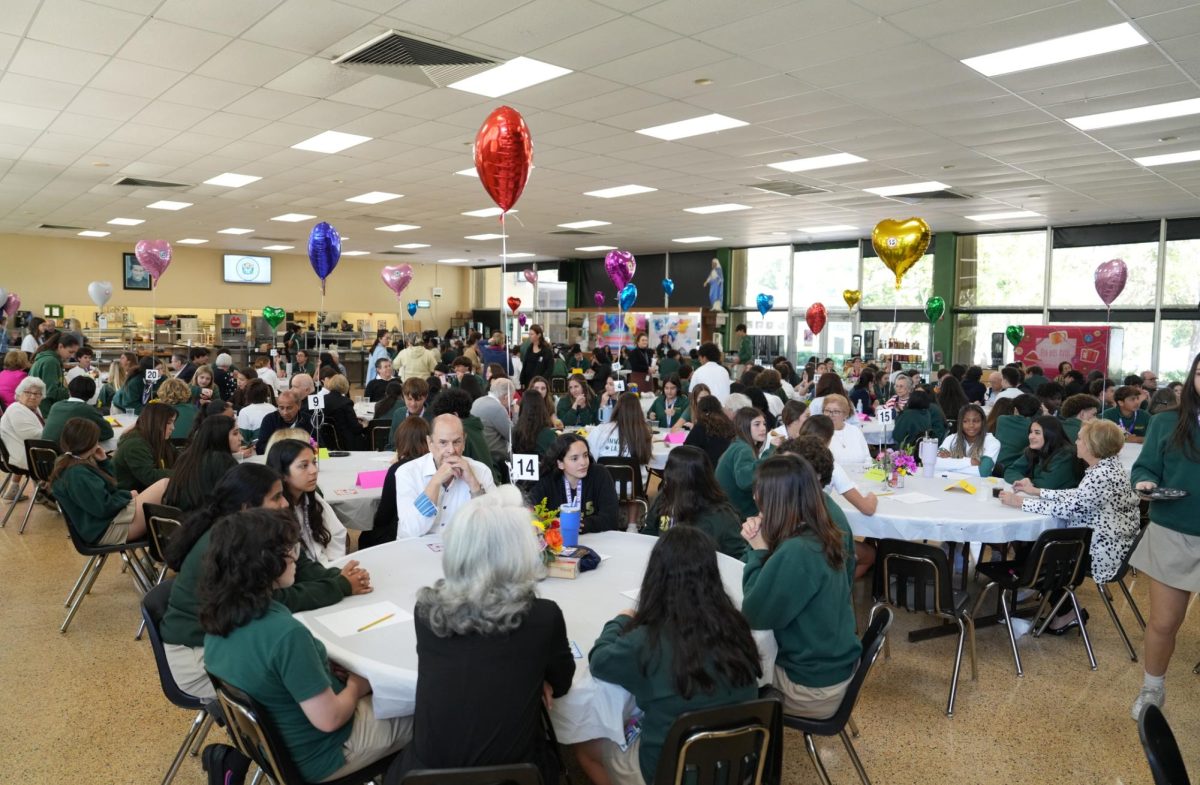 A+colorful%2C+decorated+cafeteria+filled+with+smiles+and+laughter+from+the+freshmen%2C+visiting+senior+citizens%2C+and+members+of+the+ILS+faculty+who+participated+at+the+Senior+Citizen+Prom.