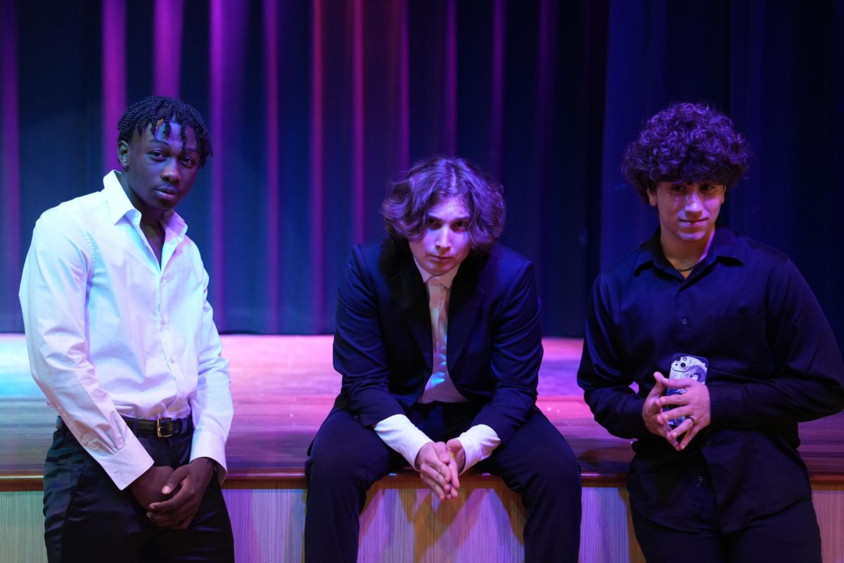 Three cast members of the ILS production of Les Misérables stun in their formal attire, anticipating the banquet. From left to right: Junior Rashad Lee (Grantaire/Bishop/Brujon), sophomore Miguel Suarez-Cabal (Inspector Javert), and Jeffrey Rojas-Machado (Jean Prouvaire/Montparnasse/Fauchelevant).