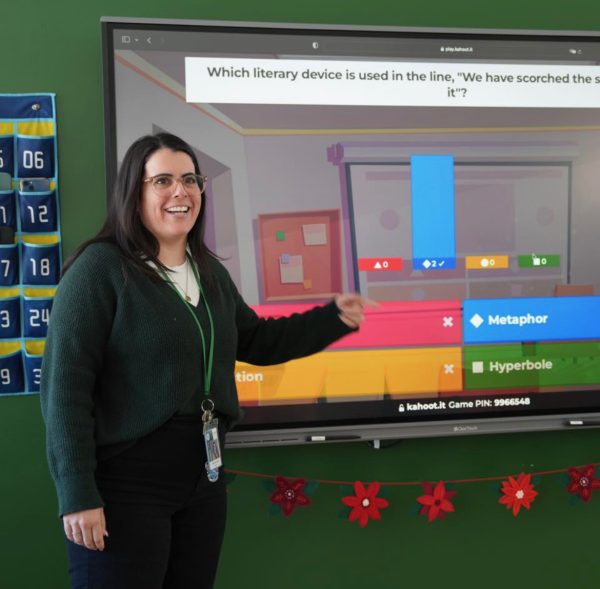 Ms. Gonzalez teaches her class using the ClearTouch board which features a Kahoot activity.