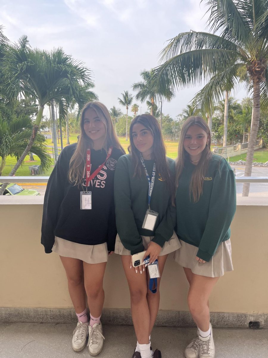 Samantha Reyes, Elena Gonzalez and Sarah Dager all pictured ready to take on senior year featuring Samantha wearing a red lanyard to show her senior pride 