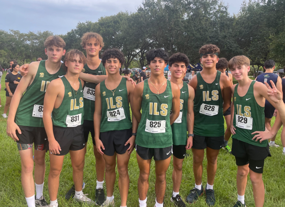 The Boys Cross Country team prepare to run for their meet.