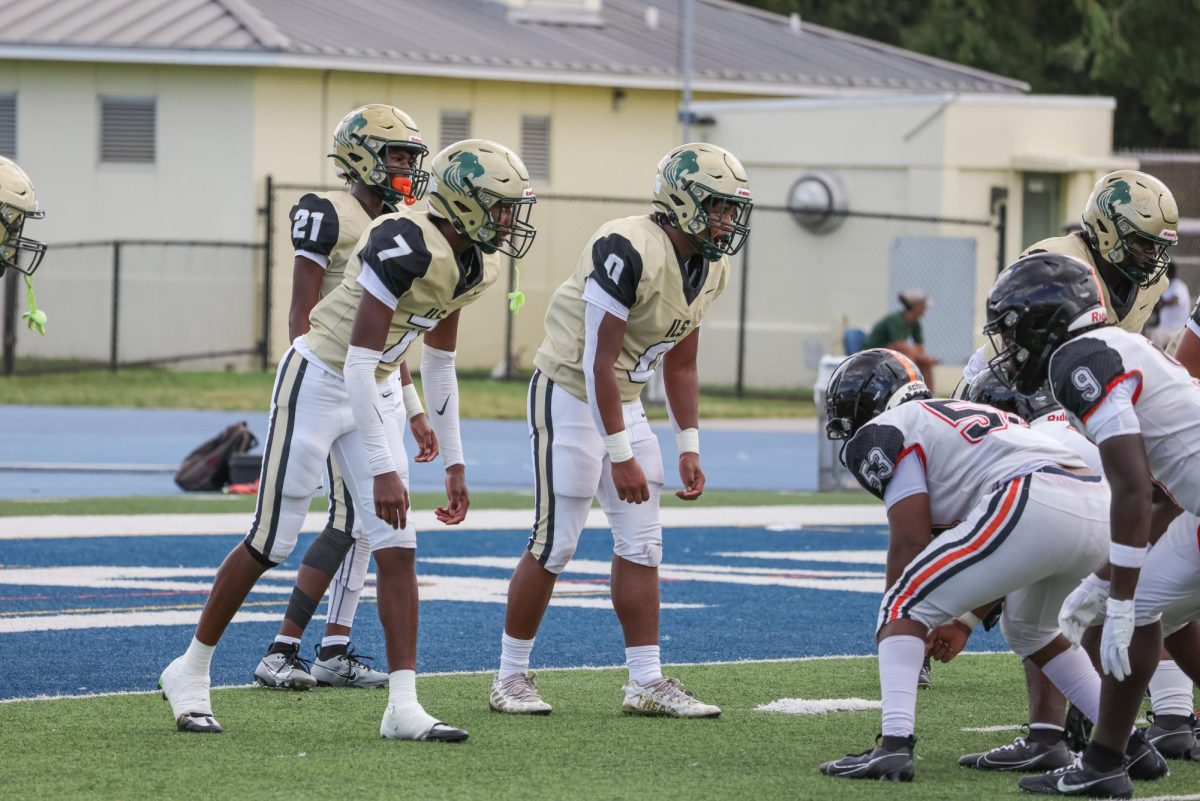 ILS Football locked in after coming back in from halftime at a recent game.