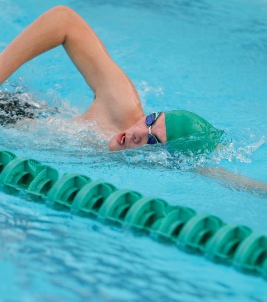 Swimming season is in full swing this fall offering a chance to competitors to cool off as they train.