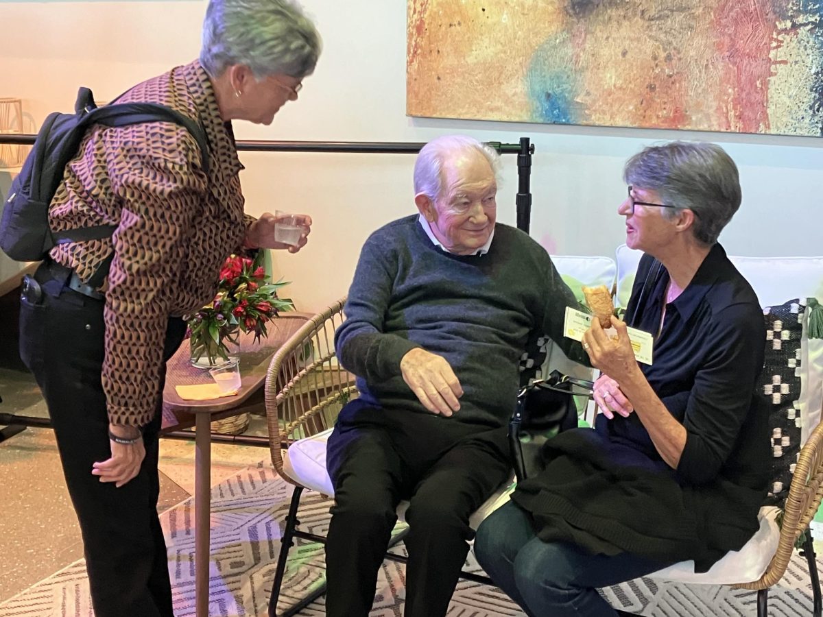 Father Frank chats with guests before the viewing at the Westchester Cultural Arts Center.