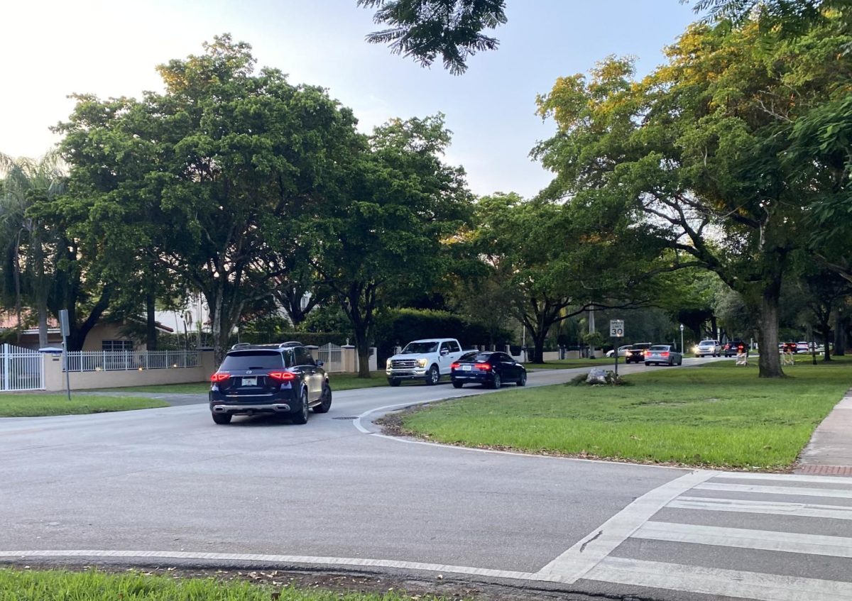 Cars driving down Granada in Coral Gables are few, but not during rush hour.