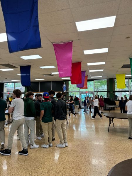 ILS celebrates different cultures with food, music, and flags in the cafeteria.