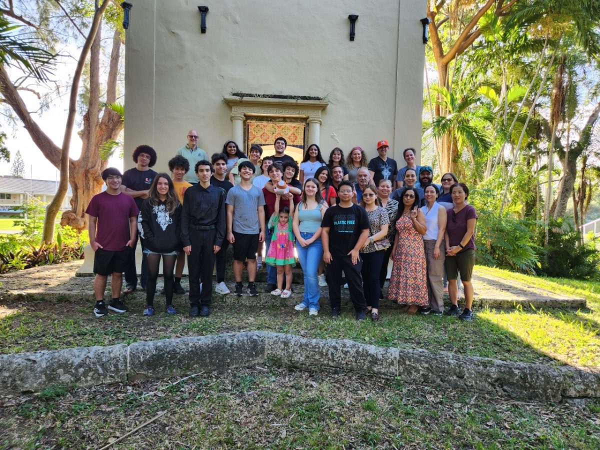 At BandsGiving, participants gather in front of the Moon Temple for a group photo.