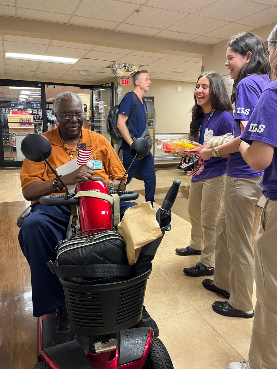 ILS Purple Hearts club members provide war veterans with cards and treats during the holiday season. 