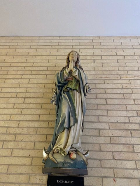 One of the many statues in the school campus illustrating Mary, Mother of Jesus Christ, and wife of Joseph, is located at the entrance to the main building.