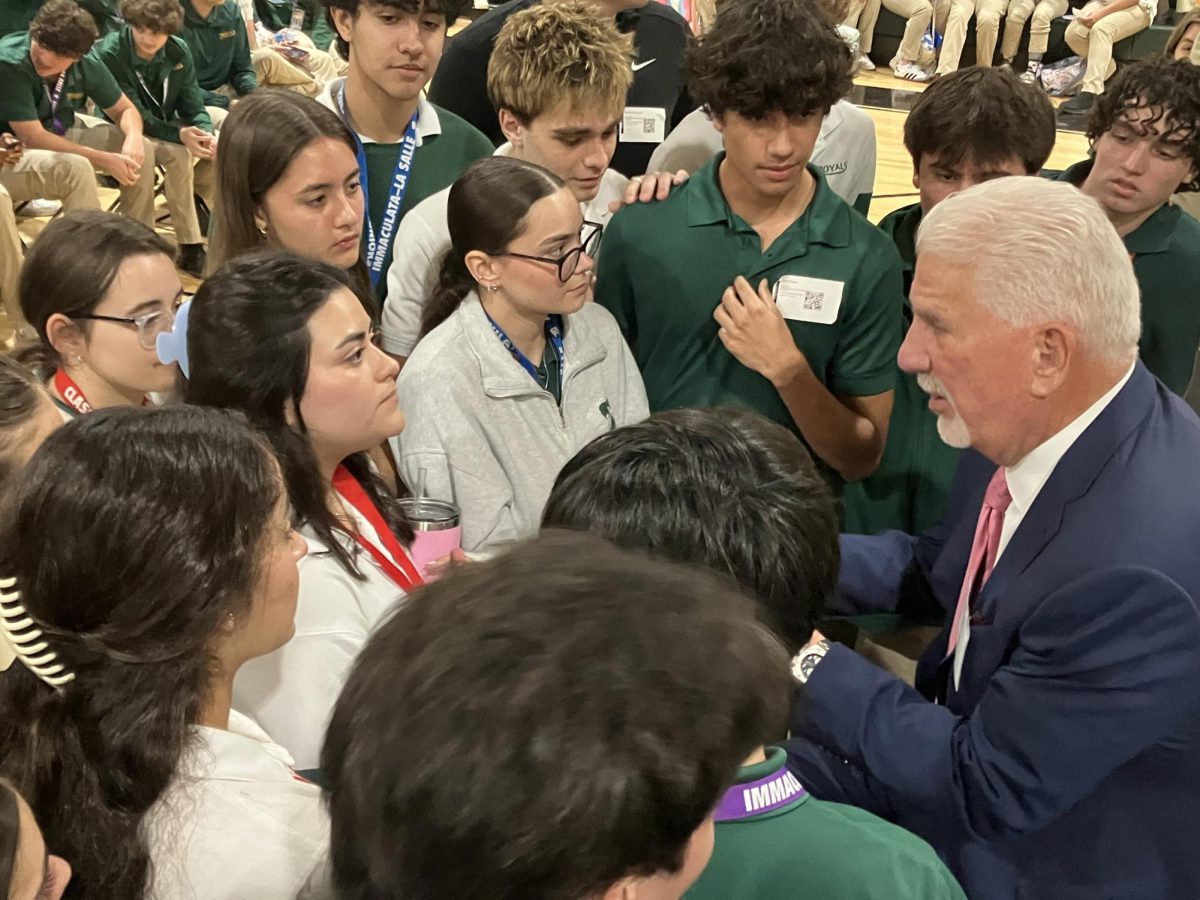 ILS illustrious alum, Mr. Rodney Barreto, fields questions from students including senior Martina Ottolina (with pink water bottle) regarding the possibility of working for Florida Fish and Wildlife where he serves as chairperson.
