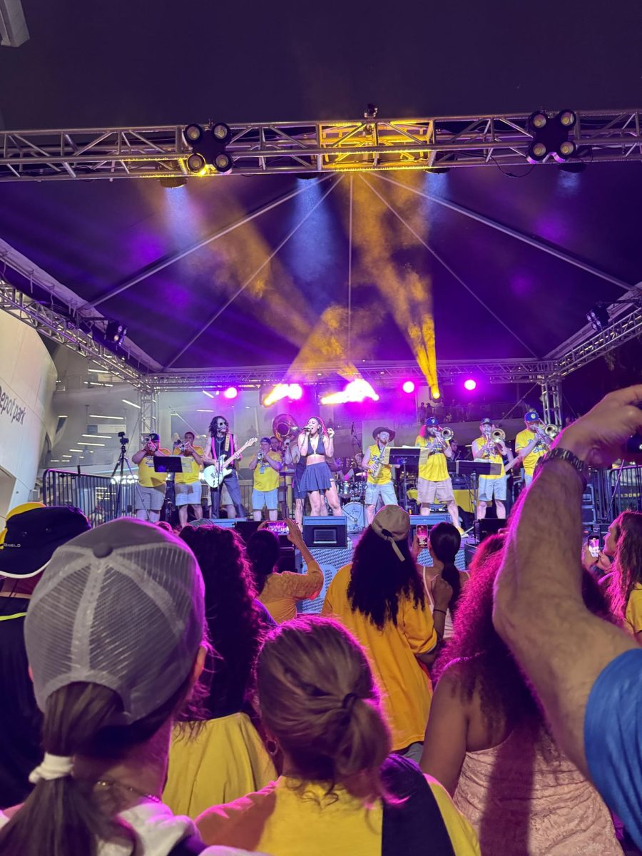 Savannah Bananas Baseball game features a rock band at Marlins Stadium. 