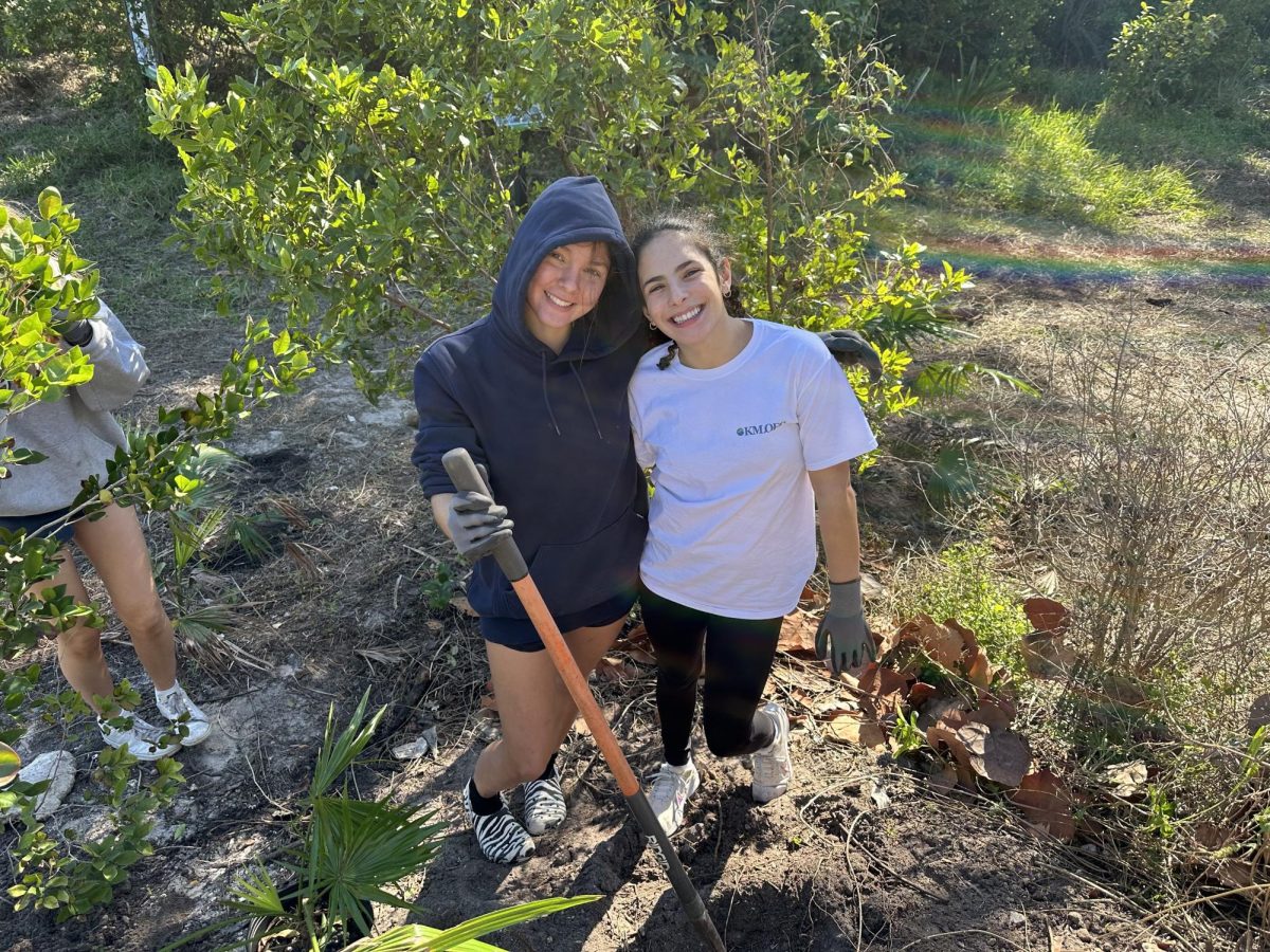 Shovels in hand, KMLOEC members help plant native species in a coastal restoration project. The initiative is part of the club’s larger mission to combat deforestation and rebuild natural habitats for endangered wildlife.