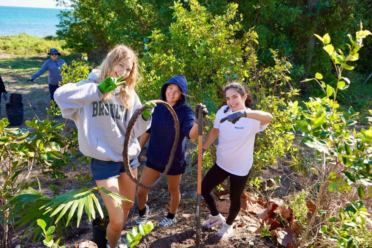 KMLOEC volunteers proudly display a rusted tire they removed from a restoration site. Large-scale cleanups like these highlight the club’s dedication to eliminating harmful waste from South Florida’s landscapes.