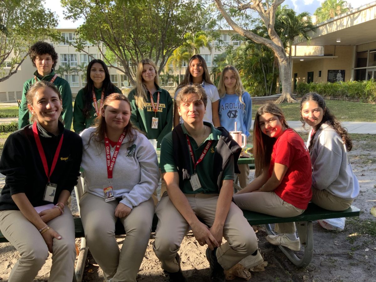 Members of the Royal Courier gather to celebrate their End-of-the-Year festivities. Back row: Thomas Sluitjers, Adriana Velasco, Jala Tabraue, Luna Fernandez, Chloe Kamhi Front row: Tina Lanza, Kat Garcia, Miguel Suarez Cabal, Bre Valdes, Ali Perez