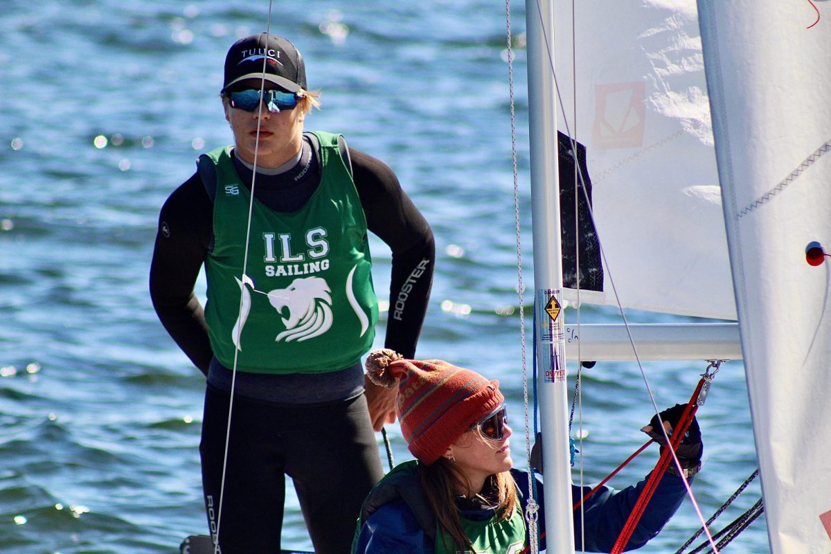 Sophomore David Coates stays focused on the water during a race with ILS Sailing, demonstrating the calm and control that have taken him to top-level competitions.
