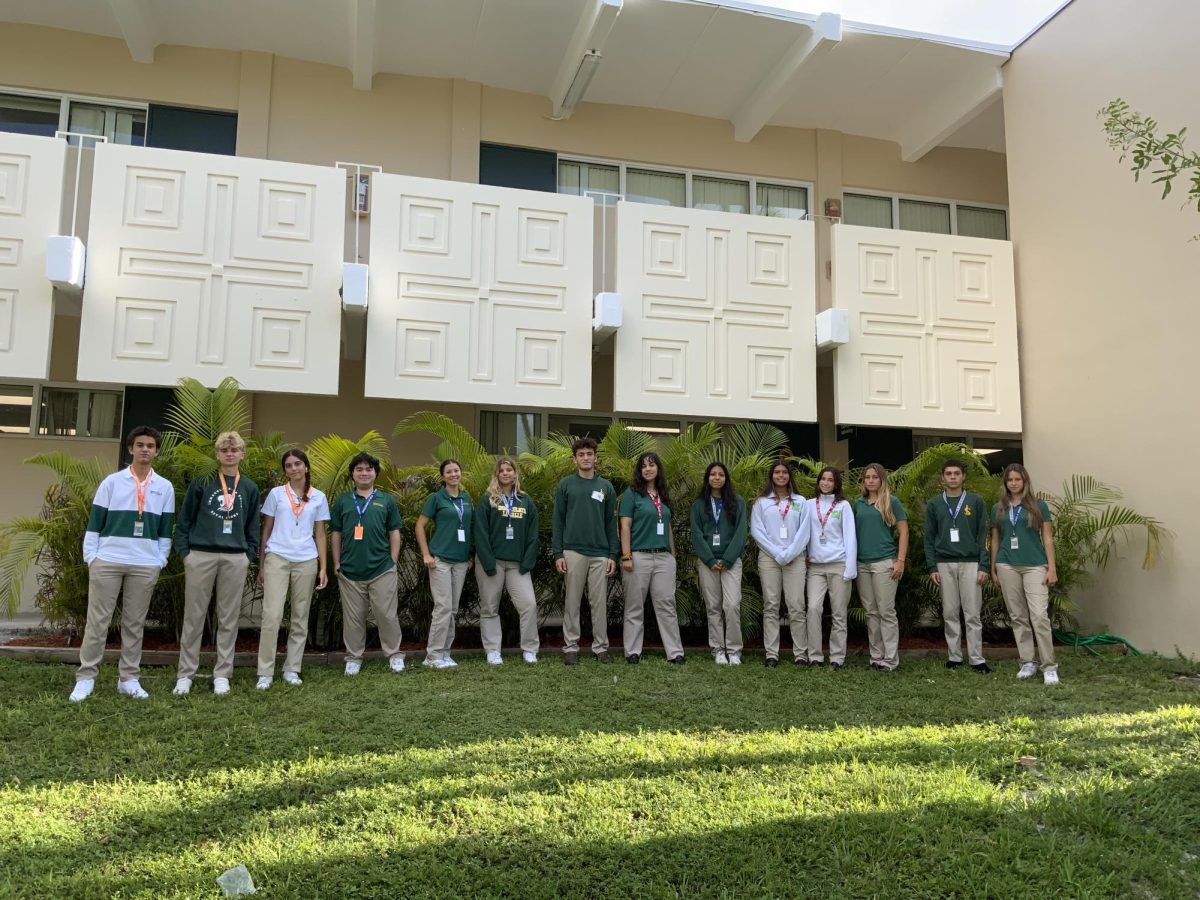 Members of the Royal Courier, ILS's student newspaper, number 14 (with one missing who was absent), a substantial growth in participation over last year.