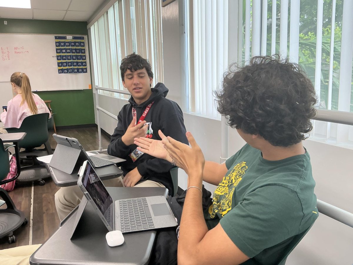 Seniors Joseph Saade and Gianluca Sperman strengthen their friendship in class. 