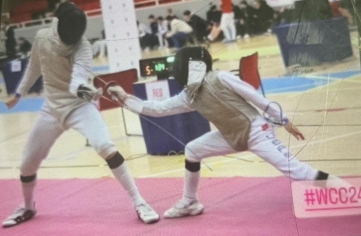 In this photo, junior Adrian Suarez, on the right, competes at a tournament in Sweden.