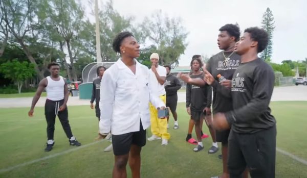 IShowSpeed & Lamar Jackson engage with members of the ILS football team.