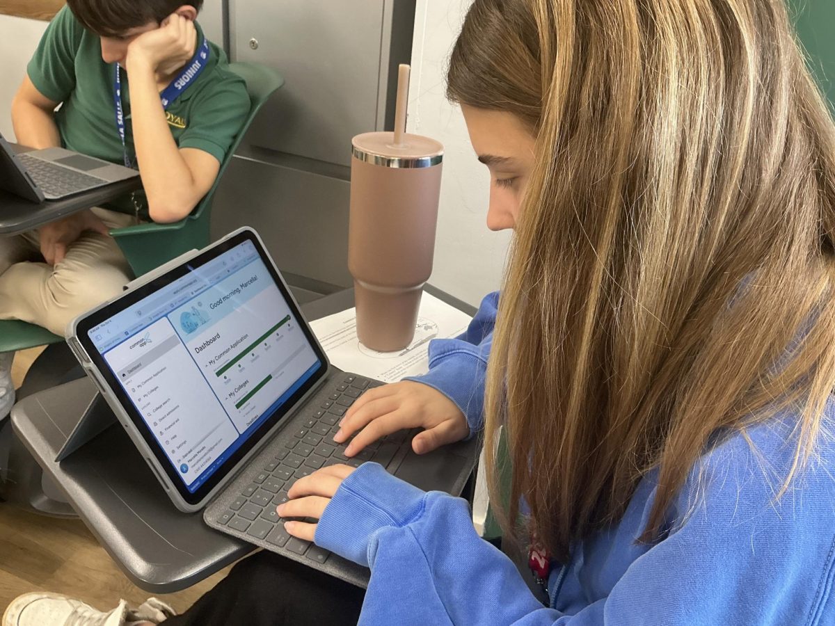 Senior Marcella Morello works on her Common Application during a small moment of free time. 